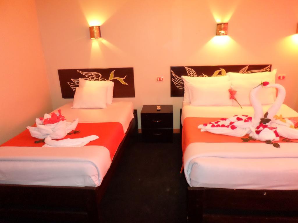 מלון Aguas Calientes New Day Machu Picchu חדר תמונה